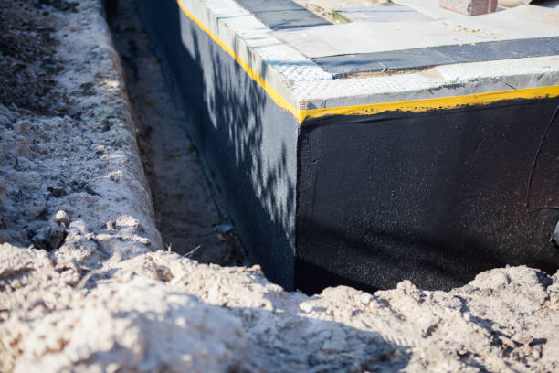 Professional Waterproofing technician working in De Mossville, KY
